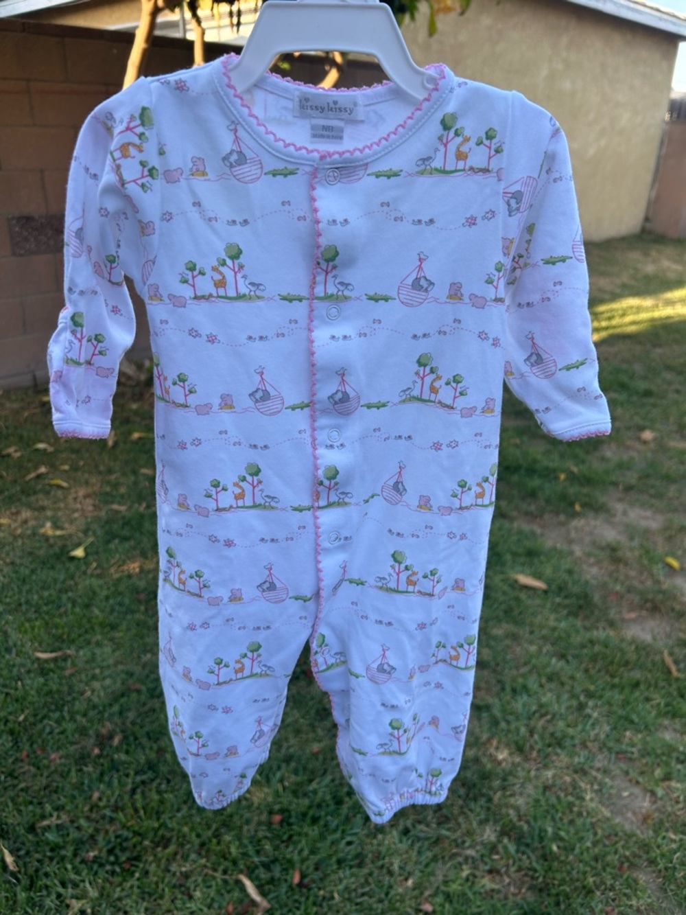Kissy Kissy White Footed One-Piece with Pink Trim and Multicolored Print
